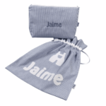 Neceser y bolsa para muda guardería personalizado azul mil rallas