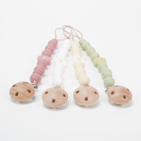 Chupetero silicona flor de grado alimentario libre de BPA, PVC, Ftalatos, cadmio y plomo. Pinza de madera y cordón de nylon de alta resistencia,bajo normativa europea EN12586:2007 (A1:2011) Color beige, blanco, verde y rosa palo