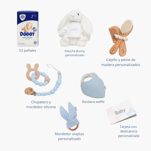 Tarta de pañales 3 pisos Sweet Cake compuesto por 52 unidades marca Dodot, peluche principal conejito personalizado, sujeta chupetes de silicona, mordedor orejitas piqué waffle,algodón y madera, cepillo para bebé de madera 100% natural, mordedor de silicona y bandana de piqué waffle. Dimensiones altura 55cm x 26cm ancho. Color azul jean
