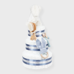 Tarta de pañales 3 pisos Sweet Cake compuesto por 52 unidades marca Dodot, peluche principal conejito personalizado, sujeta chupetes de silicona, mordedor orejitas piqué waffle,algodón y madera, cepillo para bebé de madera 100% natural, mordedor de silicona y bandana de piqué waffle. Dimensiones altura 55cm x 26cm ancho. Color azul jean